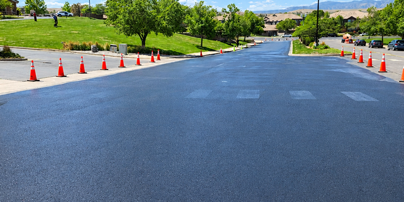 Experienced Prime Line Company technicians performing professional pavement maintenance and asphalt restoration.