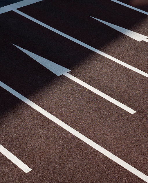 Commercial asphalt sealcoating project protecting a business parking lot in Denver, Colorado.