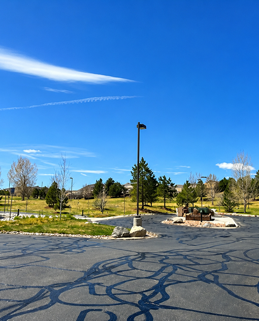Professional roadway pavement maintenance services completed by Prime Line Company to restore asphalt durability and extend pavement life in Colorado.