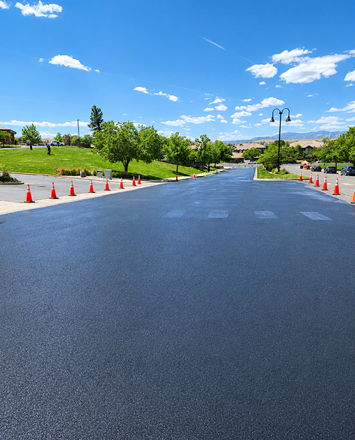 High-visibility traffic lane markings installed by Prime Line Company for roadway safety.